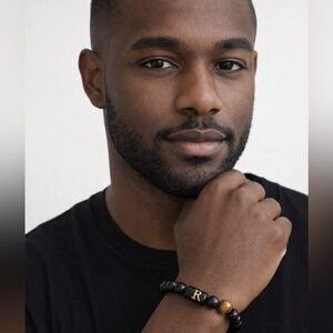 Black Beaded Bracelet with Gold 'R' Accent and Tiger Eye Bead
